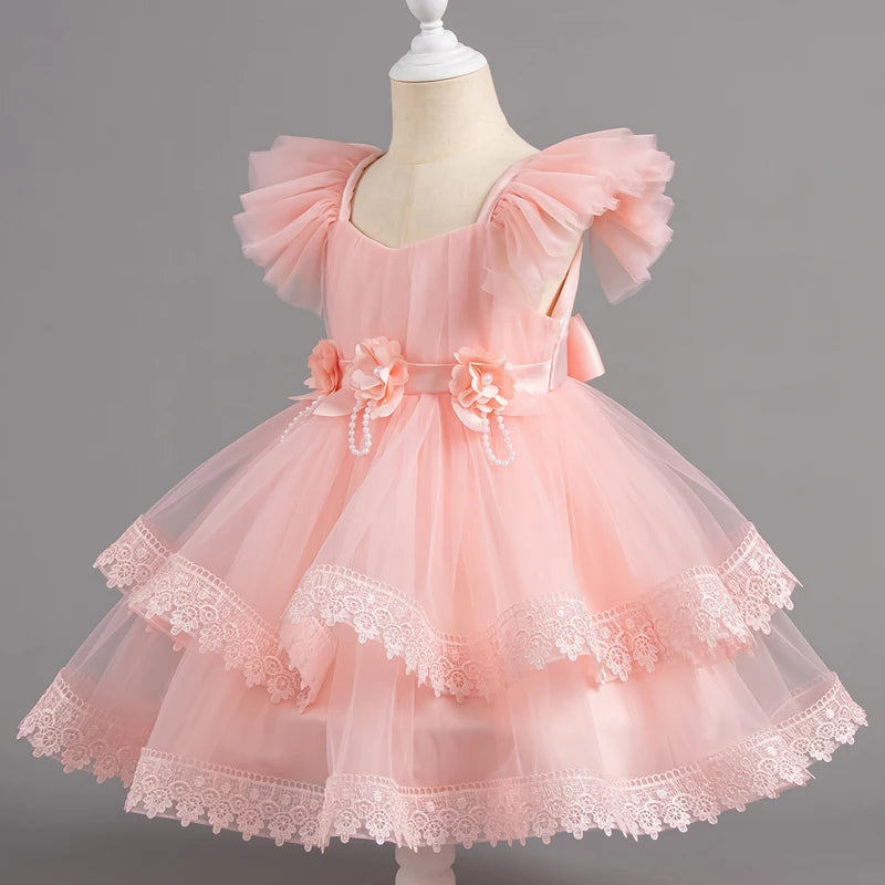 Pink girls party dress three-quarter front view
