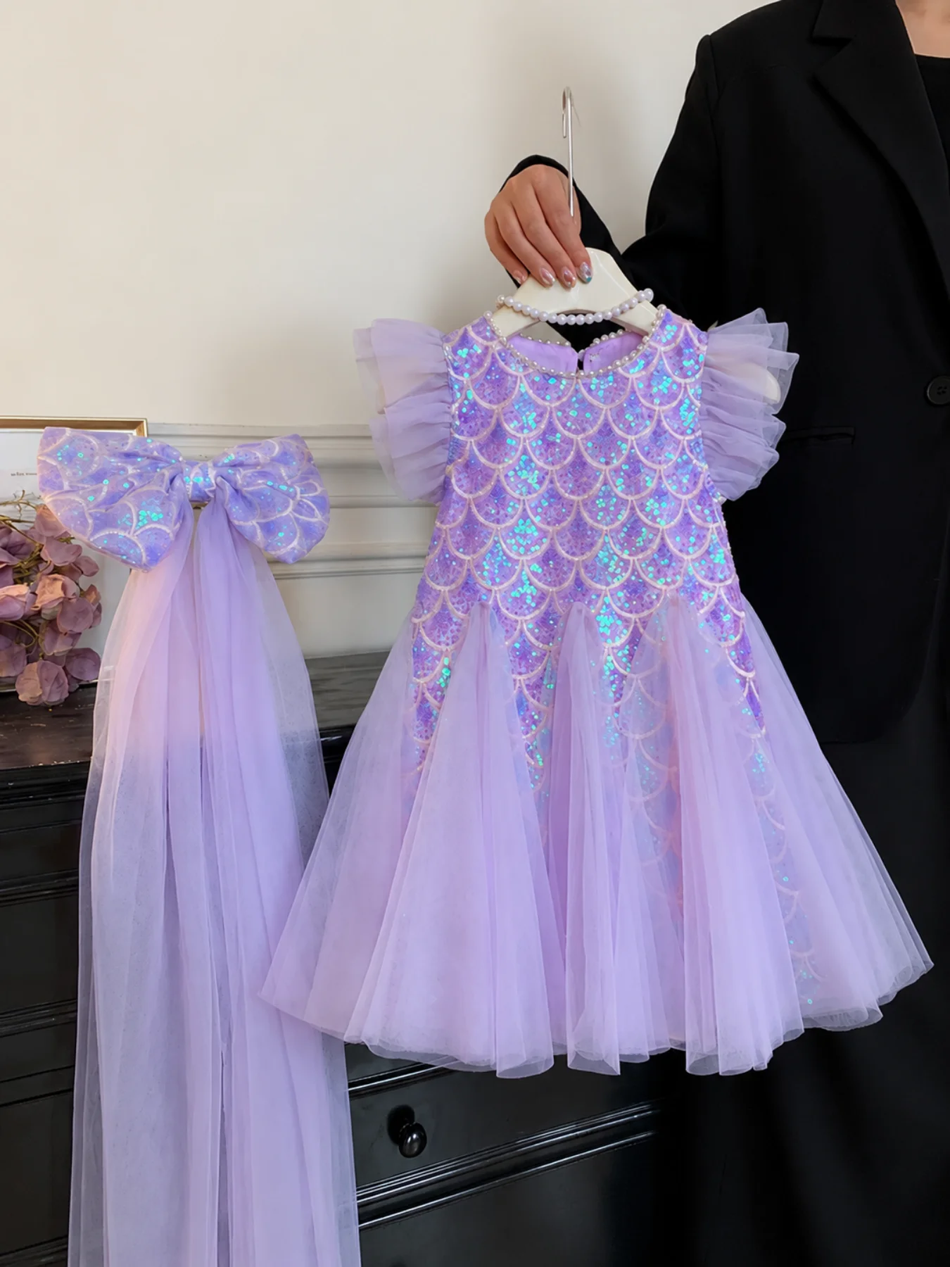 Purple sequin mermaid dress with matching bow and tulle train