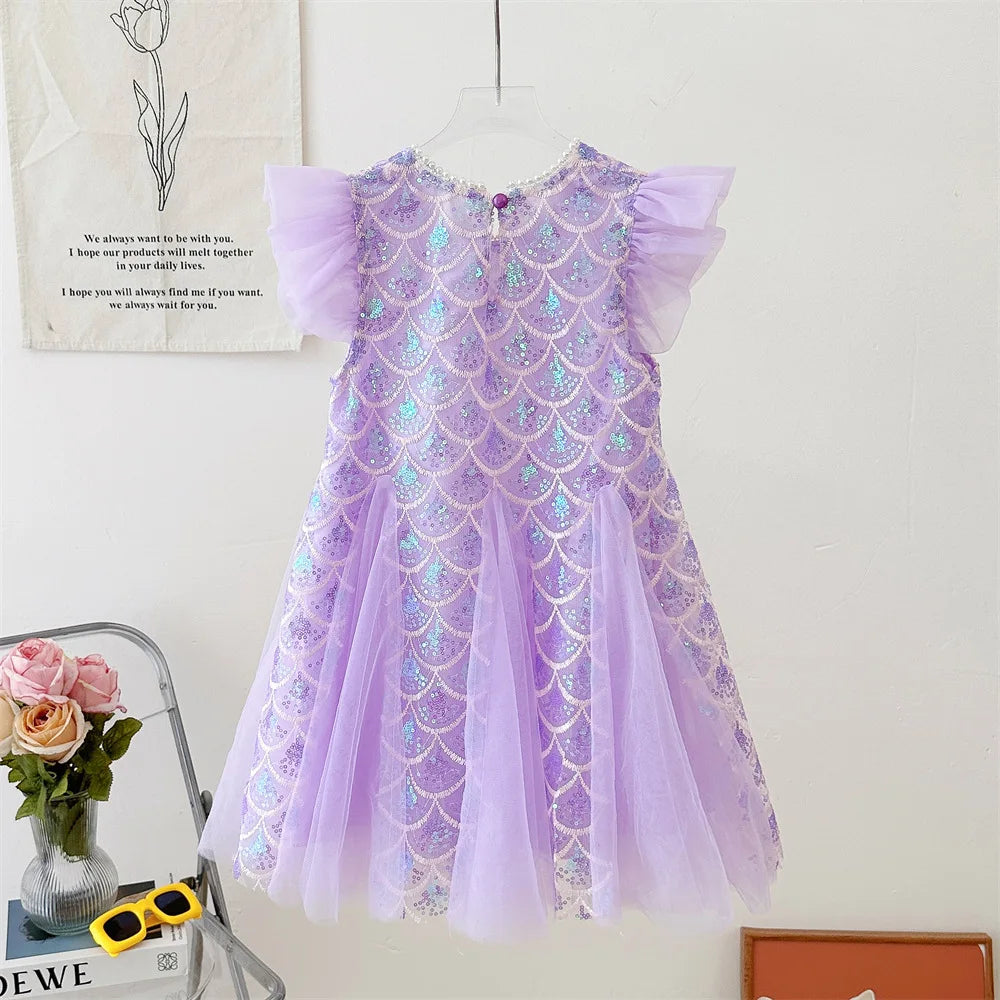 Purple sequin mermaid dress hanging back view