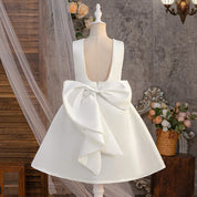 White pearl bow flower girl dress back view with oversized bow