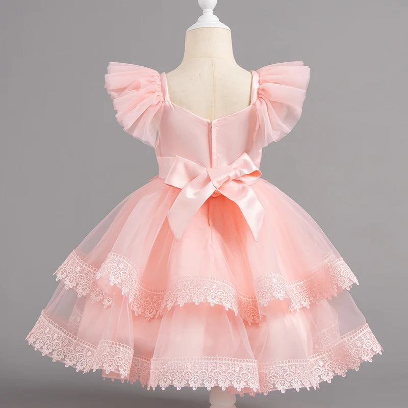 Pink lace bloom party dress back view with bow