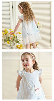 Blue bunny dress shown from the back and in a front detail view