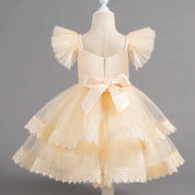 Yellow girls party dress back view with bow