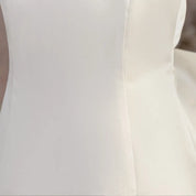 Fitted bodice seam detail on white flower girl dress