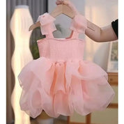 Babelio pink toddler princess dress with fluffy tulle, displayed in a cozy indoor room